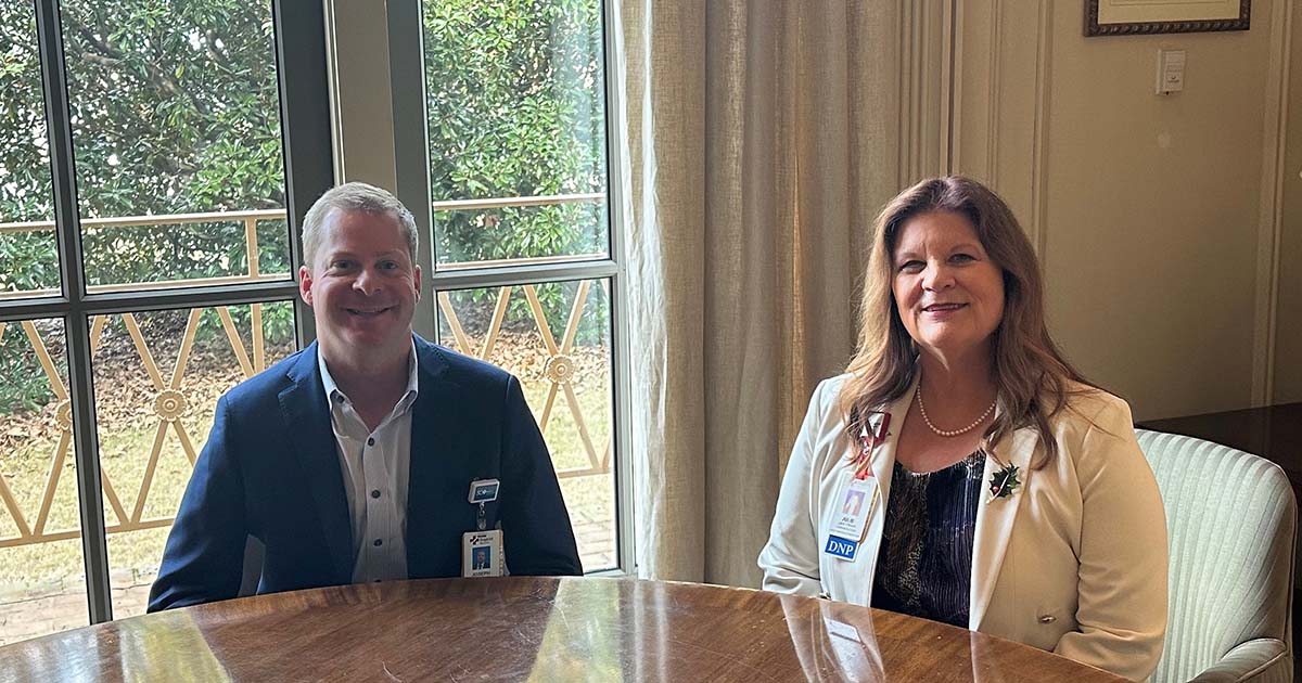 Joseph M. Cook and Julie Firman of Baptist Health