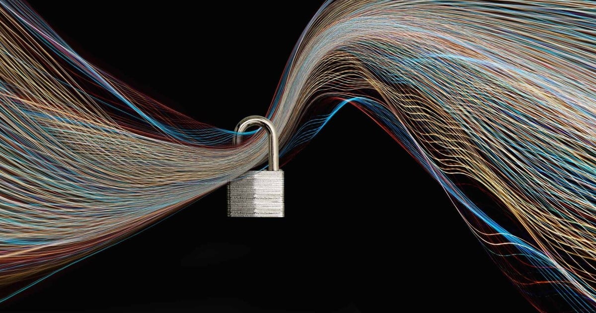 Lock around various fiberoptic wires signifying numerous IoT connections