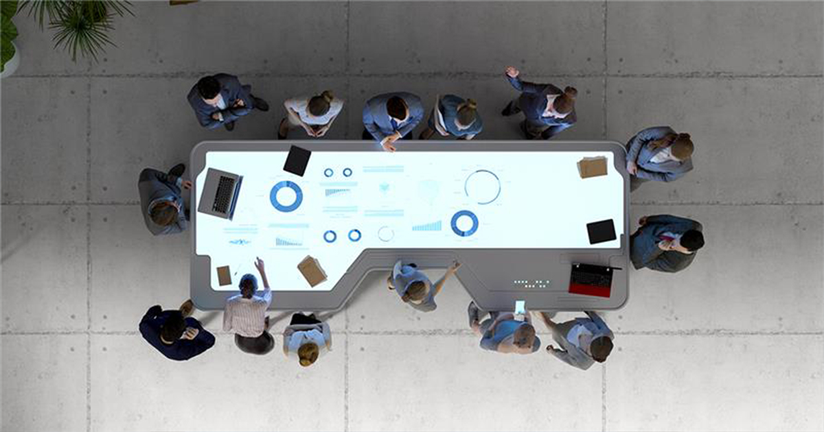 People gathered at meeting table