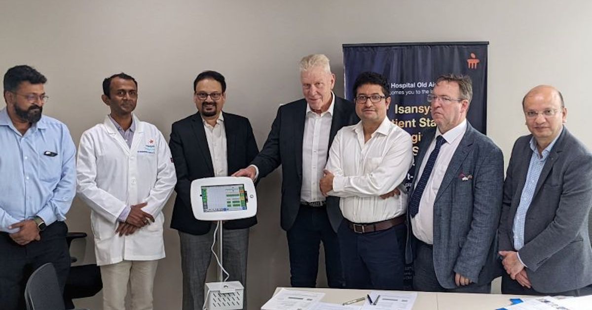 Officials from Manipal Hospitals and Isansys Lifecare pose during the signing of a partnership to adopt the Patient Status Engine