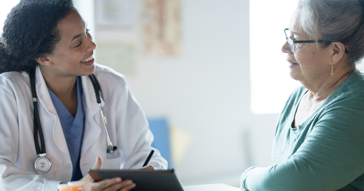 Doctor talking to patient