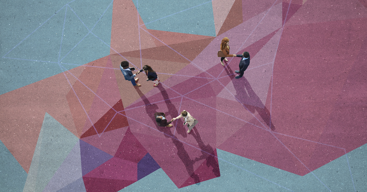 Businesspeople on painted pattern on asphalt