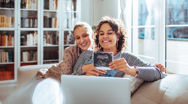 Couple sharing ultrasound photo
