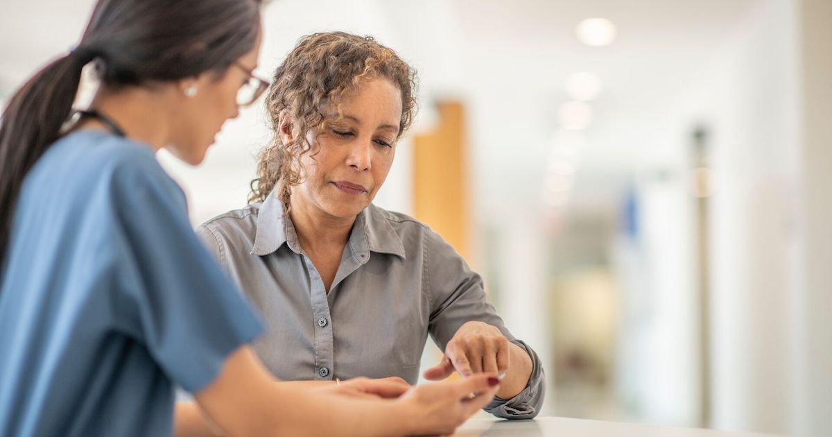 Doctor shows patient analytics