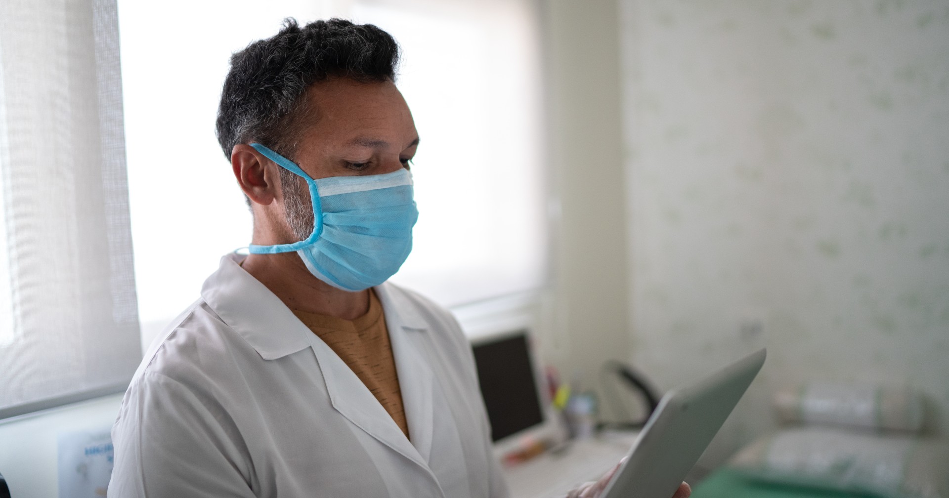 Doctor reading EHR