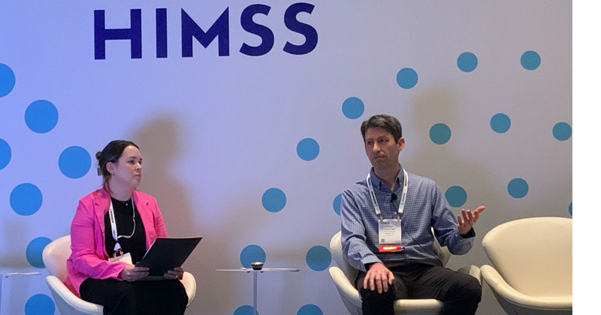 From left to right, Erica Matti and Joshua Legler at HIMSS24