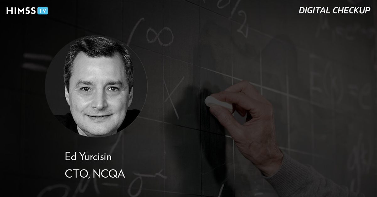 Edward Yurcisin, chief technology officer at the NCQA with Professor writing on blackboard as a background