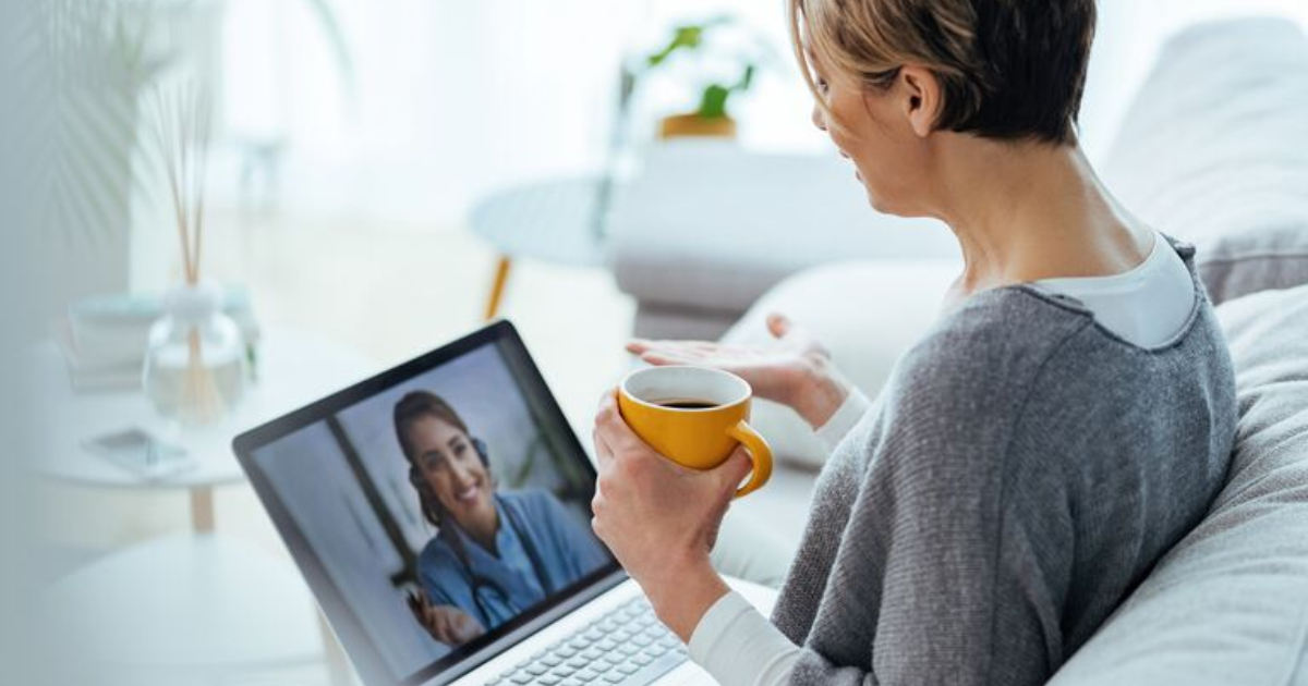 Person talking to doctor on laptop