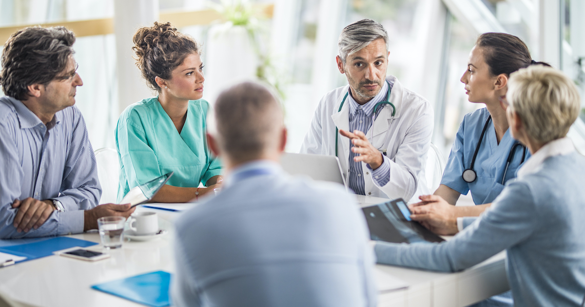 Hospital staff in a business meeting