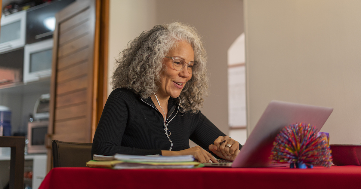 Person using a laptop at home