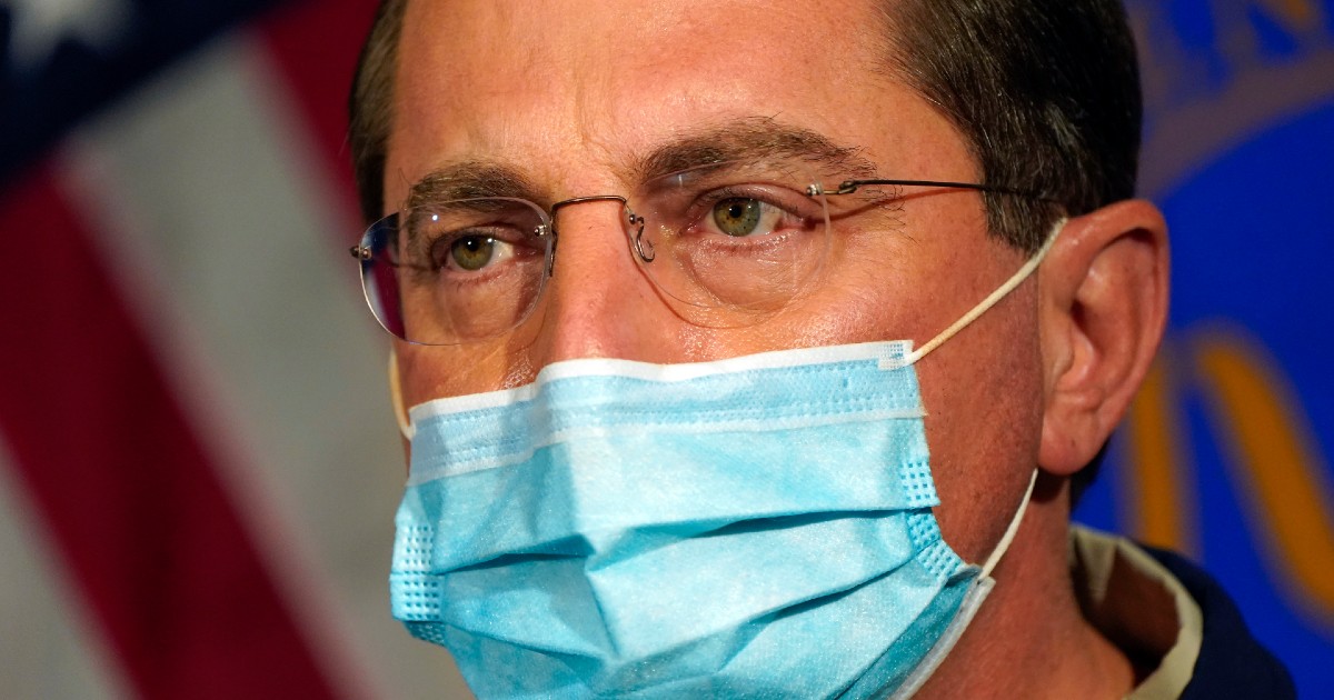 Secretary Alex Azar behind a mask