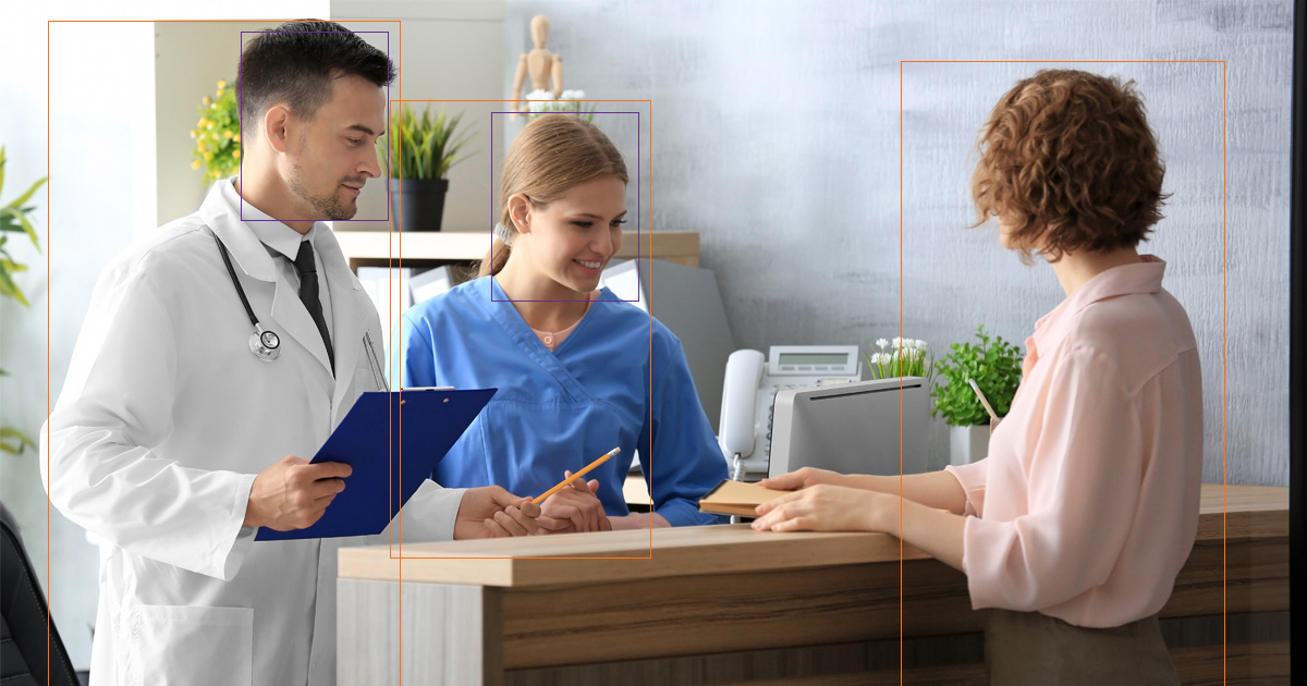 Person talking to healthcare workers