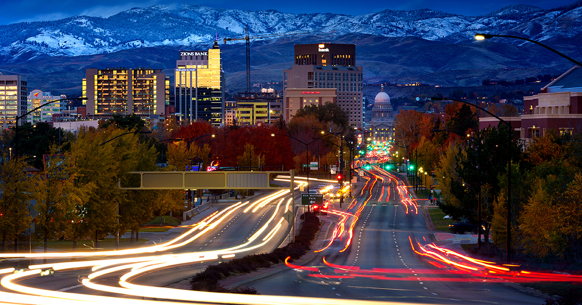Idaho scene, city buildings below mountain range
