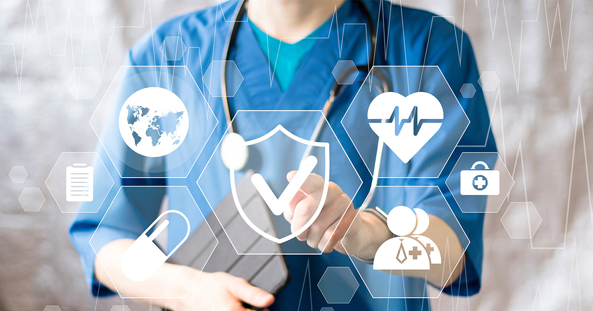Healthcare worker pointing to medical icons