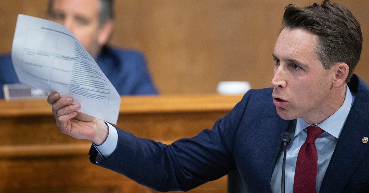 Senator Hawley, holding up a paper, speaks in Congress