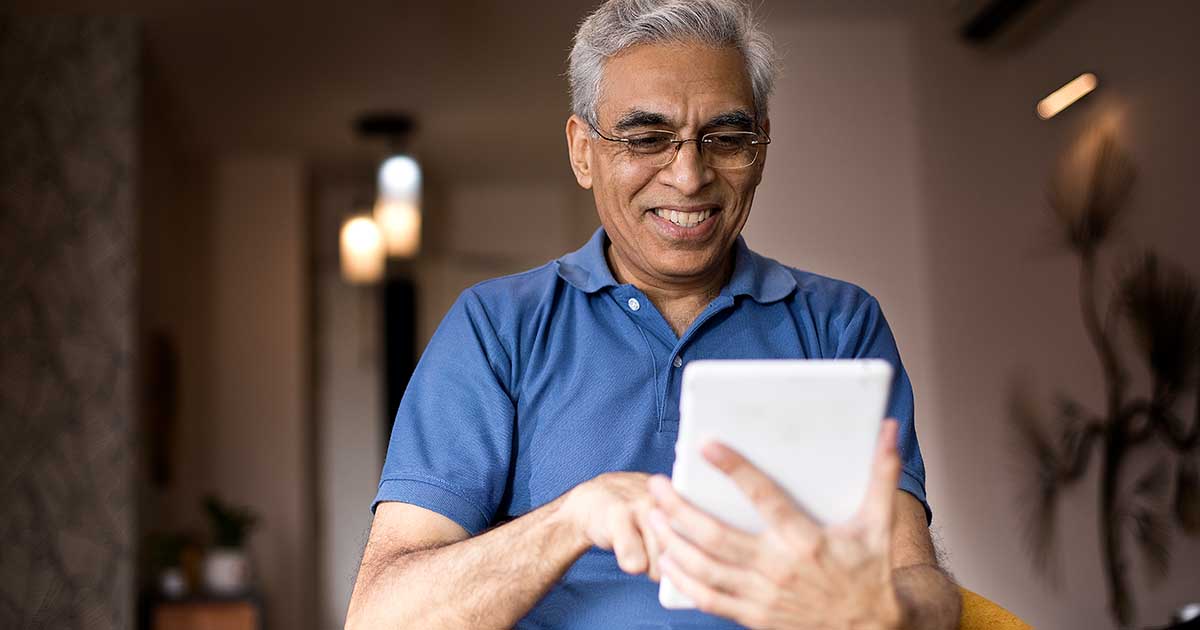 man holding a tablet