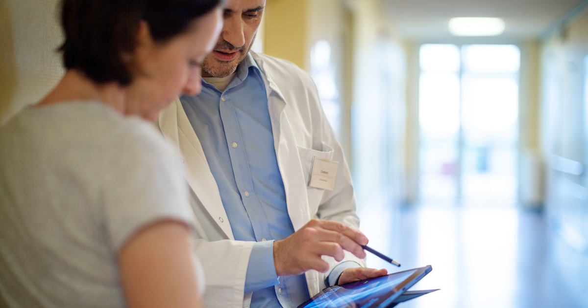 Doctor talking to patient