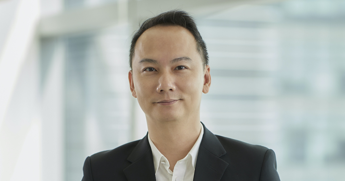 Portrait headshot of Dr Adam Chee, National University of Singapore