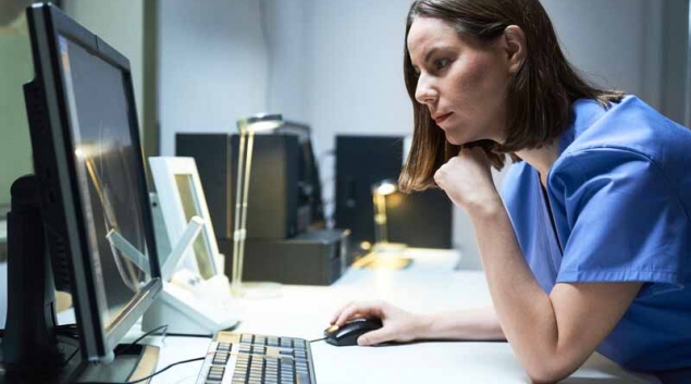 Healthcare worker using computer