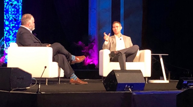 Reid Oakes, executive vice president of Analytics at HIMSS, talks to MLB veteran Theo Epstein, at HIMSS21 in Las Vegas on Monday.