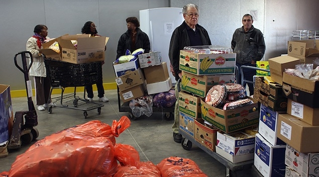 Food pantry workers unloading boxes