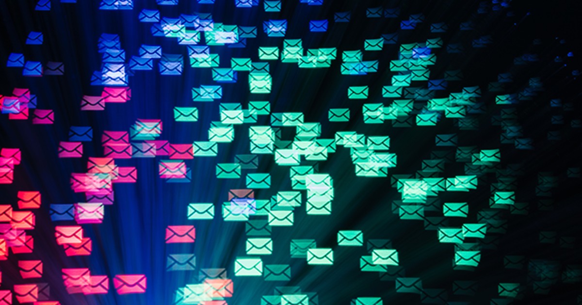 Email icons flying through a dark background