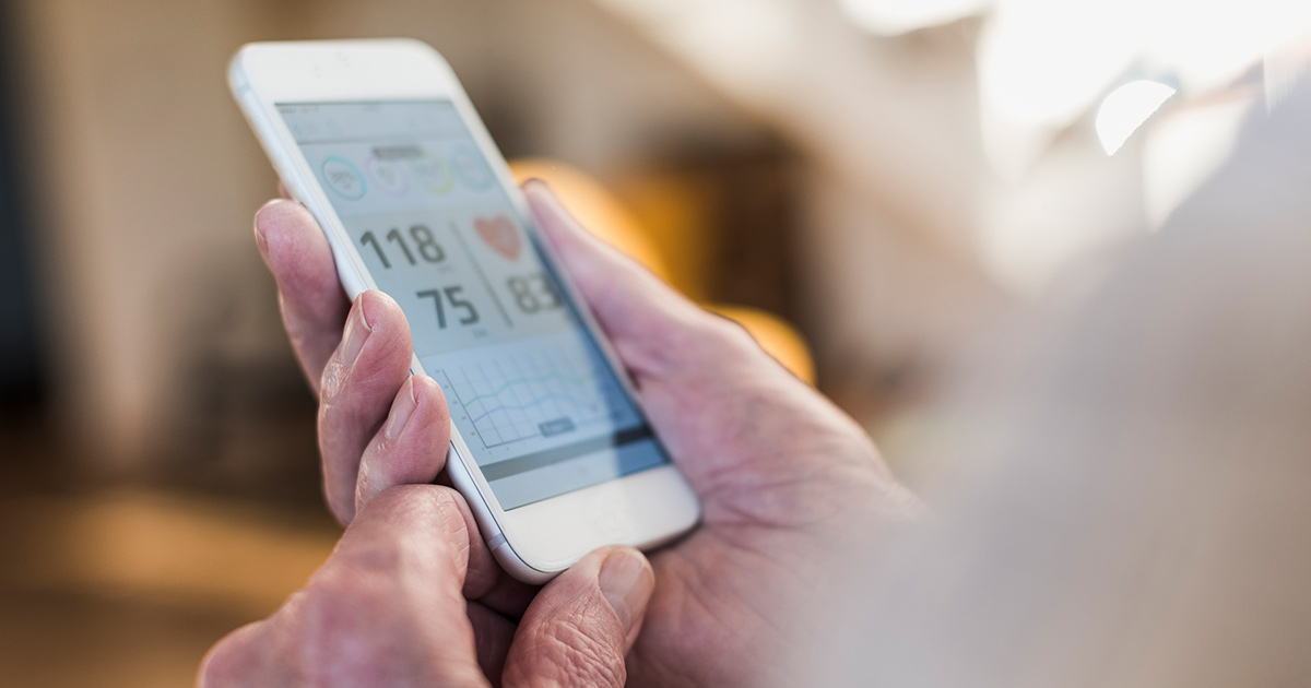 Person using heart rate app on a smartphone