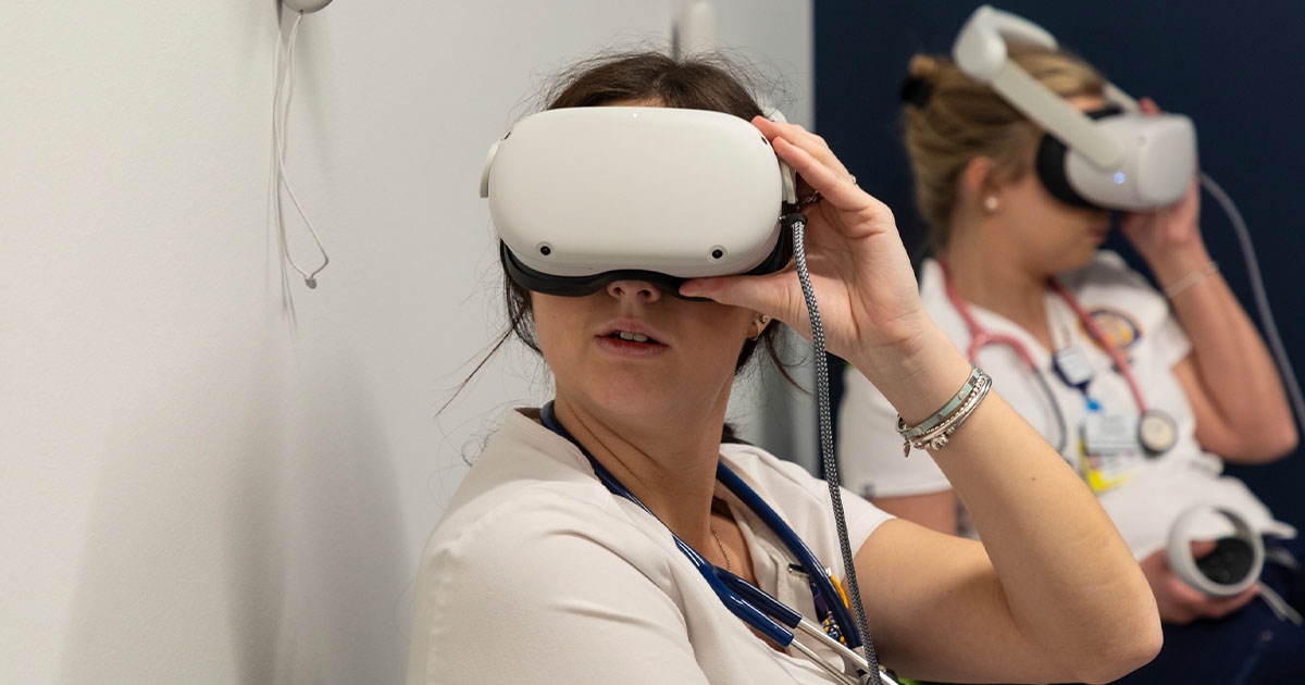 University of Rochester Nursing students use VR headsets to train and prep for exams.