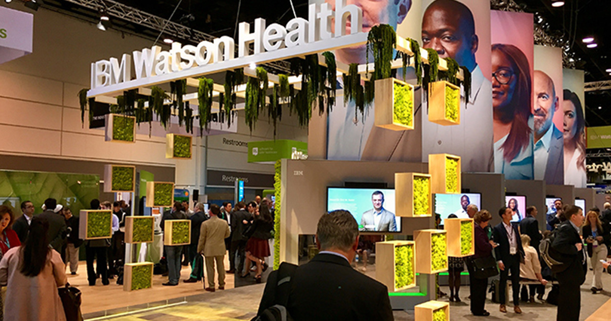 IBM Watson Health logo at a trade show