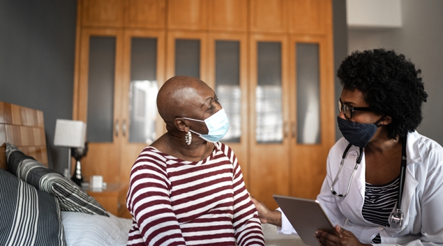 Doctor and patient in masks