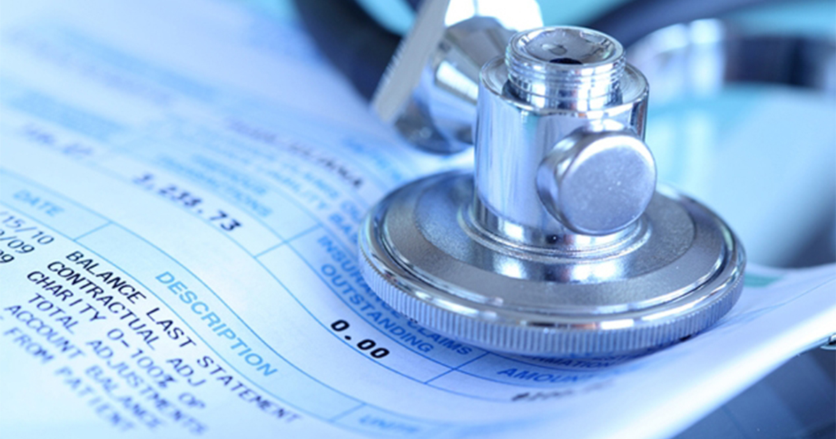 Cancer care bill and stethoscope