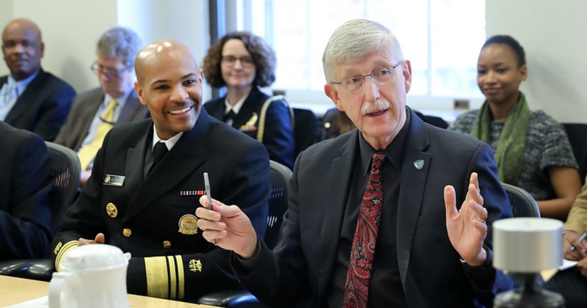 Former Surgeon General Dr. Jerome Adams and Dr. Francis Collins
