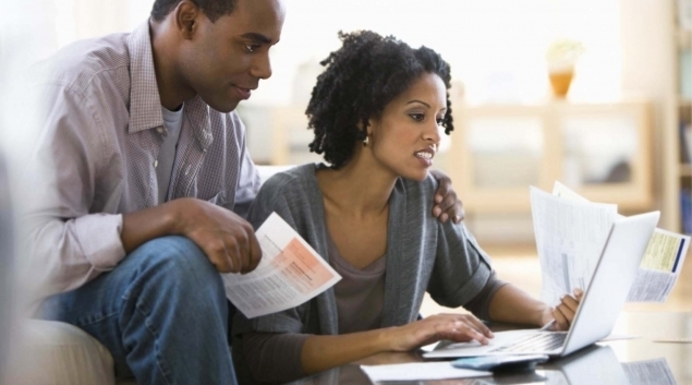Couple looking at bills
