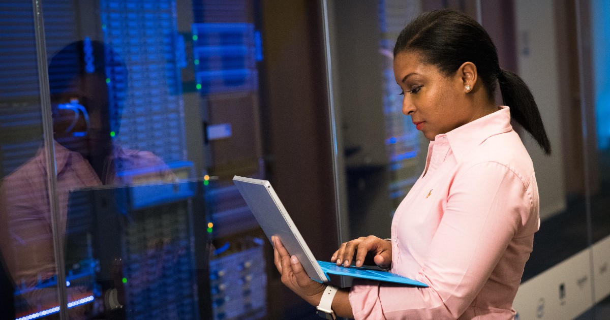 Cybersecurity professional checks incident monitoring logs