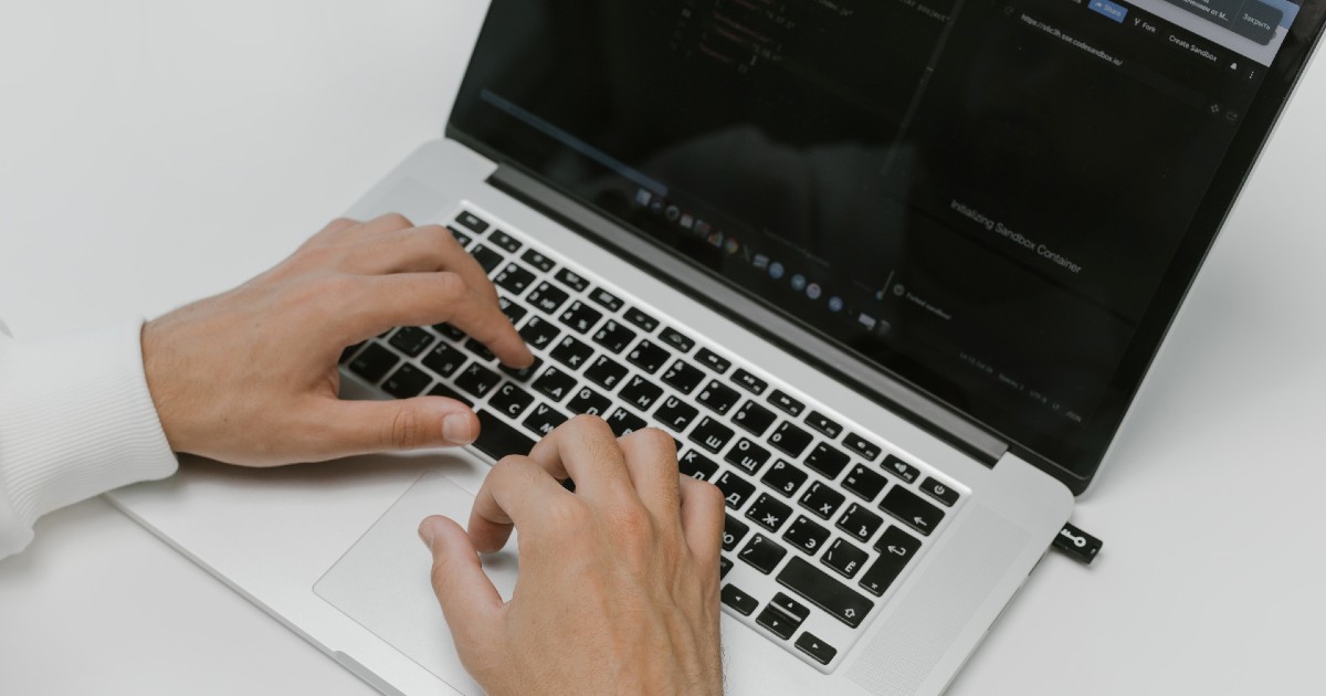 A person with a computer