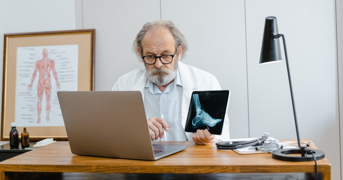 A medical professional on the computer