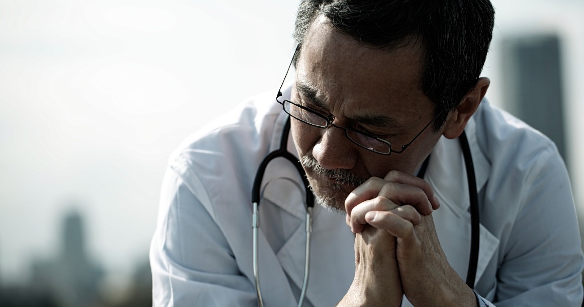 A doctor looking worried
