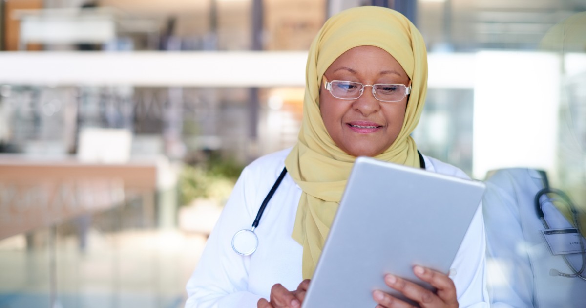 A doctor with a tablet