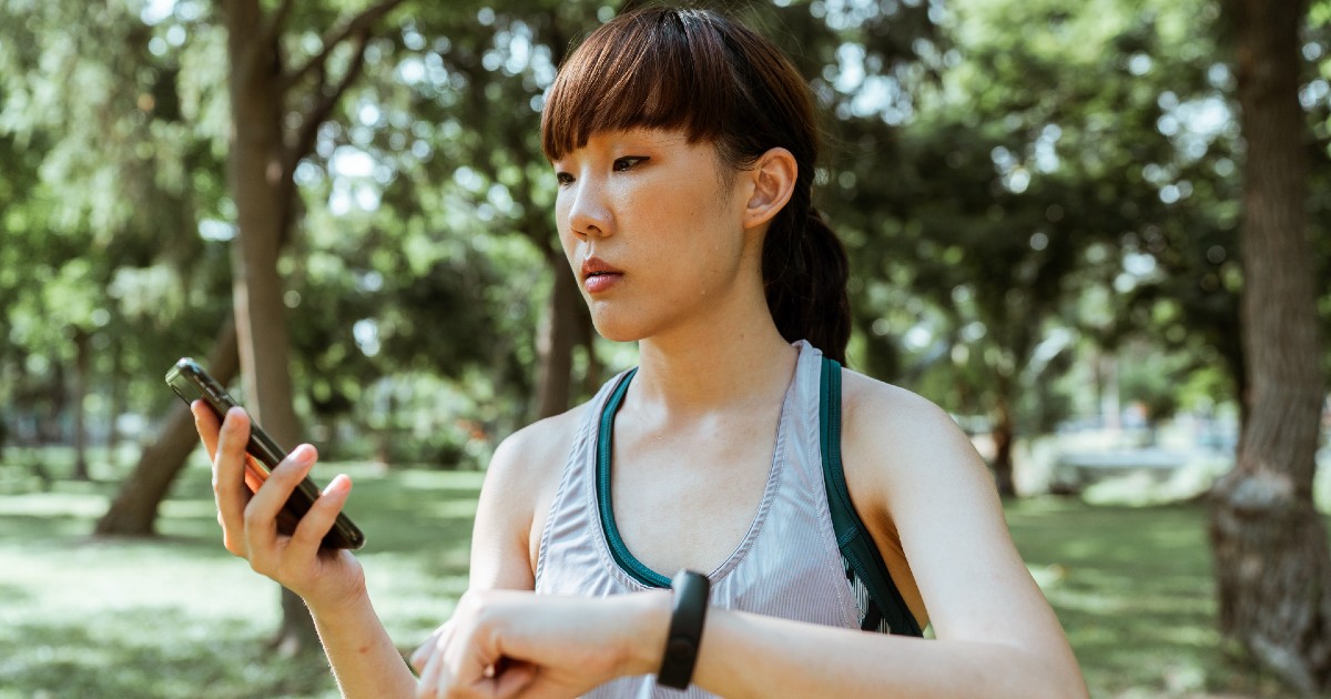 A person with a fitness tracking watch