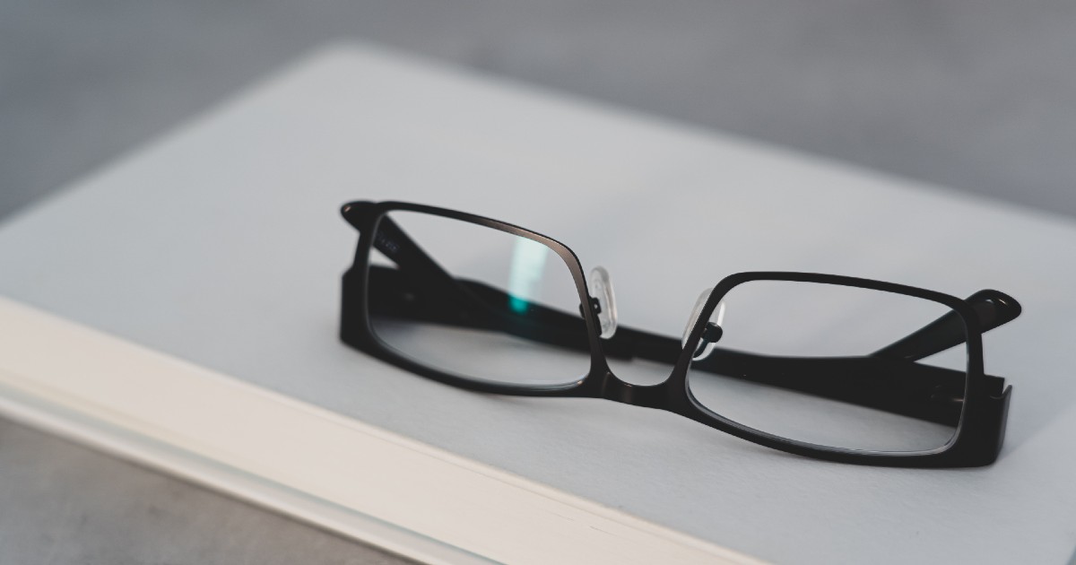 Eyeglasses on notebook