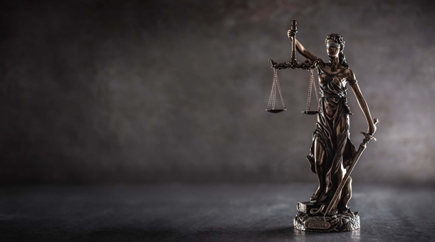 Statuette of Justice holding scales