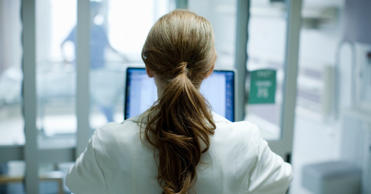 A doctor with a laptop