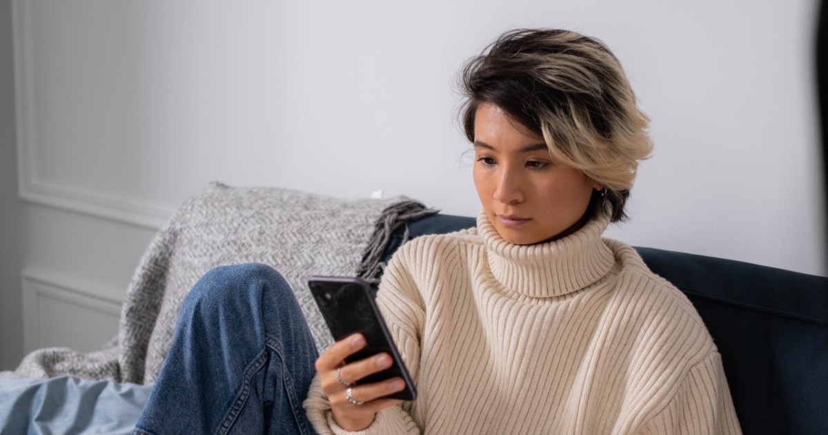 A person looking at their phone