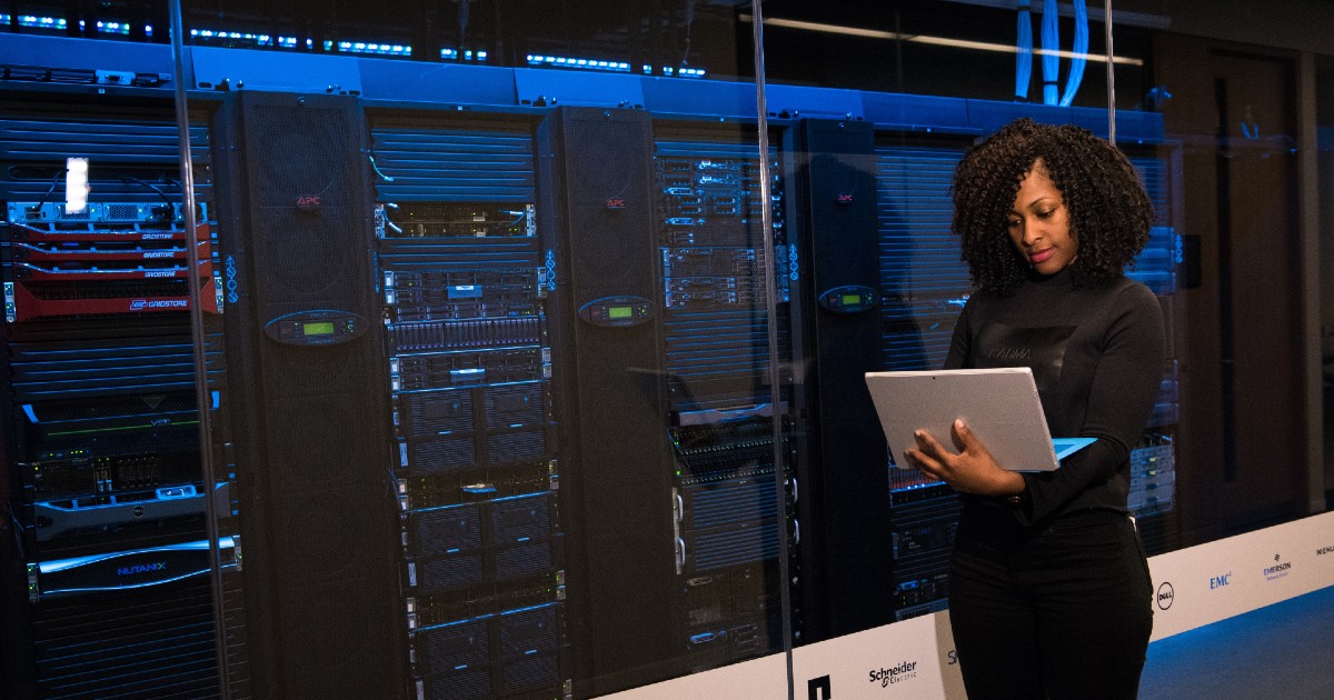 A person in a server room