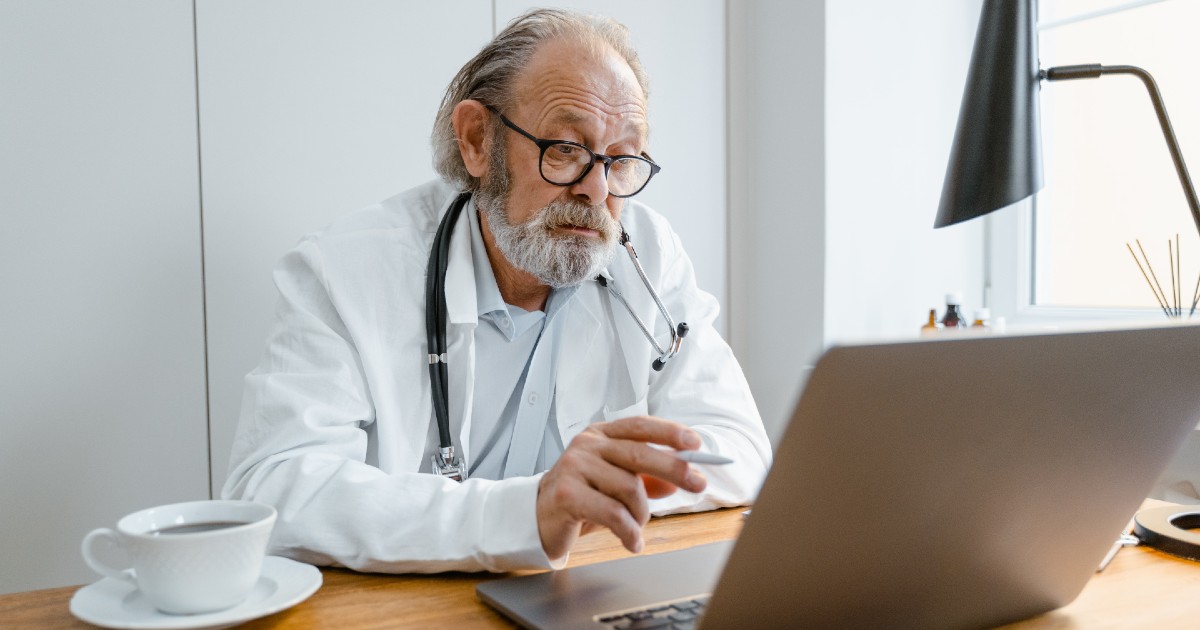 A doctor performing a telehealth consultation