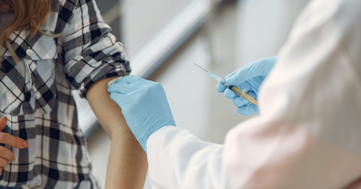 A person getting the COVID-19 shot