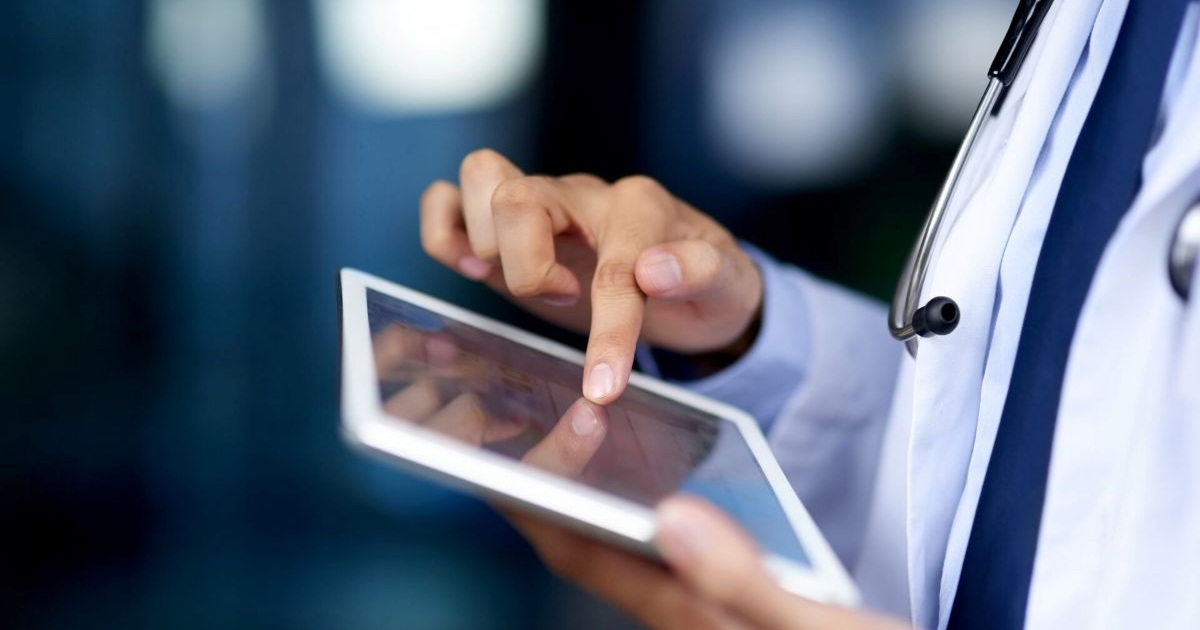 doctor using a tablet