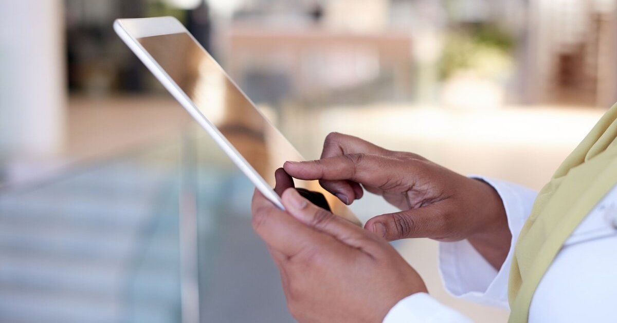 Person works on tablet