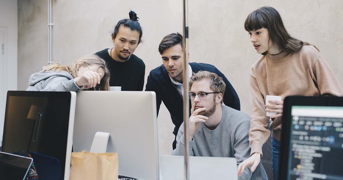 IT staff members solving a problem