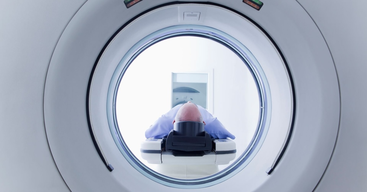 A patient undergoing CT scanning
